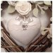 Cuore/fiocco nascita shabby in vimini con rose e cuore di piquet bianco