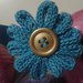 Cerchietto Fiore fatto a mano in tessuto verde petrolio con fiore azzurro all'uncinetto e bottone dorato