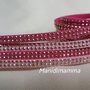 bracciale modello alcantara fucsia e rosa con borchie color oro