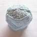Baby berretto neonato in puro cotone lavorato a mano ai ferri con rifiniture ad uncinetto