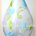 Bottiglia di vetro dipinta con tappo fiore in plastica pet 