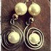 orecchini ad aspirale con perla bianca