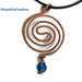 Collana in rame martellato doppia spirale celtica e perla blu