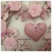 Cuore/fiocco nascita in vimini con roselline ,farfalle e cuore rosa