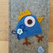 Porta cellulare in feltro decorato con uccellino e bottoni per iPhone