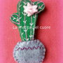 Calamita cactus con fiore rosa di feltro in vaso