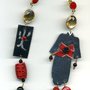 Orecchini con Geisha e simbolo cinese  in cartoncino nero, onice e corallo bambu'