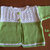 Completo giacchino e abito in filo verde e bianco melange per femminuccia lavorato a mano