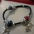 Bracciale in gomma con charms pendenti