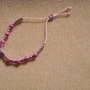 BRACCIALETTO DA BAMBINA FATTO A MANO CON PERLINE FUCSIA, MACRAME'