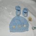 Scarpette + cappellino bebè realizzati ad uncinetto in cotone o lana celeste 