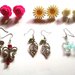Set orecchini "Garden earrings" con margherite e rose in resina, foglie e farfalle in metallo