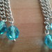 orecchini pendenti con rosellina in stoffa e perle azzurre