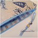Pochette in cotone stampato fantasia marina sui toni dei beige e azzurri