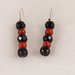 Orecchini in madrepora arancio e onice nero fatti a mano - Madrepora earrings in orange and black onyx handmade.