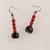 Orecchini con corallo rosso e onice nero fatti a mano - earrings with red coral and black onyx handmade.