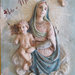 Bassorilievo restaurato "Madonna e Gesù bambino"