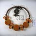 Bracciale Semirigido con perle a foro largo arancione e perline in bronzo fatto a mano