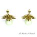 Orecchini pendenti con perle Swarovski verde pastello e ali dorate fatti a mano – Edera
