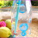 Bottiglia di vetro con cannuccia azzurra con “glu glu” e bolle dipinte a mano