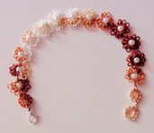 Elegantissimo braccialetto a fiori con perla centrale