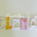 Elena: ghirlanda di lettere in cotone per una decorazione in stoffa per la cameretta