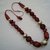 Collana legno bordeaux