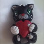 Gattino nero con cuore