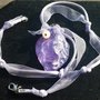 Collana con testa di leone in vetro viola