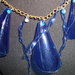 collana campanule e riccioli azzurri