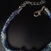 Bracciale blu mare in cotone con ciondolo a forma di coccinella