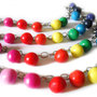 Bracciale perle arcobaleno modellate a mano in porcellana fredda