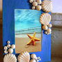 Cornice portafoto conchiglie e coralli di mare dipinta e decorata a mano in porcellana fredda