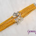 Bracciale multifile giallo scamosciato con cuori, love, infinito e treccia