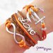 Bracciale multifile arancio e marrone in corda con ancora, love, infinito e treccia