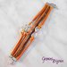 Bracciale multifile arancio e marrone in corda con ancora, love, infinito e treccia