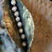 SPILLA FOGLIA in cartapesta, perle di fiume e ottone  fatta a mano 