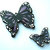 Decorazione farfalle viola da parete modellate con la porcellana fredda e dipinte a mano
