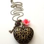 Collana color bronzo con ciondolo cuore,chiave e fiore in fimo idea regalo natale per lei