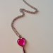 Collana con ciondolo chiave e cuore rosa