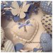 Cuore/fiocco nascita  8 cuori  azzurro con farfalla bianca 