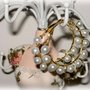 Orecchini n.178: cerchi dorati con perle intrecciate