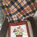 cuscino quillow Vaso di fiori a forma di cuore - un cuscino con dentro un plaid