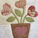 cuscino quillow Vaso di fiori a forma di cuore - un cuscino con dentro un plaid