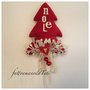 Albero natalizio in velluto rosso con la scritta noel in feltro
