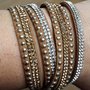 Bracciale slake marrone multigiro con strass e borchie