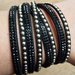 Bracciale slake nero con strass neri e borchie