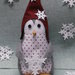 Pinguino  con fiocco di neve in pannolenci 