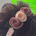 cerchietto per capelli con fiori sul rosa 