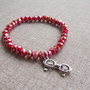 Bracciale con mezzo cristallo e charm